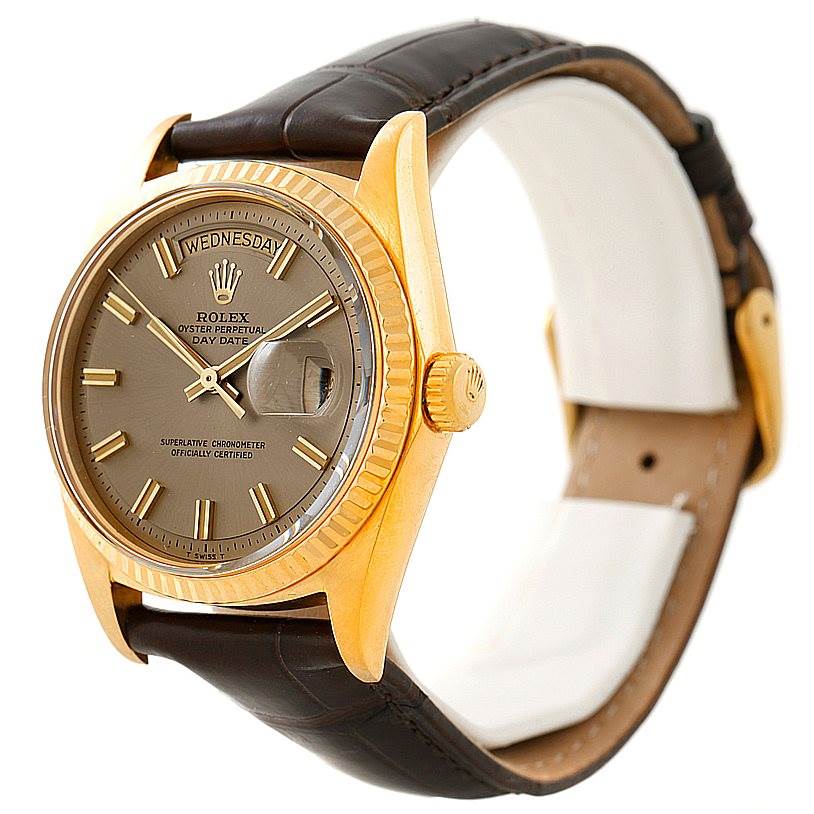 This image shows a Rolex President 1803 Men's Yellow Gold Brown Dial 1803 Men's Yellow Gold Brown Dial model watch from a three-quarter angle, highlighting the dial, crown, and leather strap.