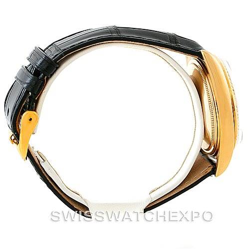 The image shows a side profile of a Rolex President 1803 Men
s Yellow Gold Black Dial 1803 Men
s Yellow Gold Black Dial watch, highlighting the strap, buckle, and part of the gold case.