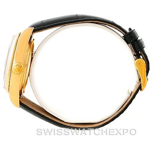 This image shows a side view of a Rolex President 18038 Men's Yellow Gold Black Dial 18038 Men's Yellow Gold Black Dial model watch, highlighting the case, crown, and black leather strap.