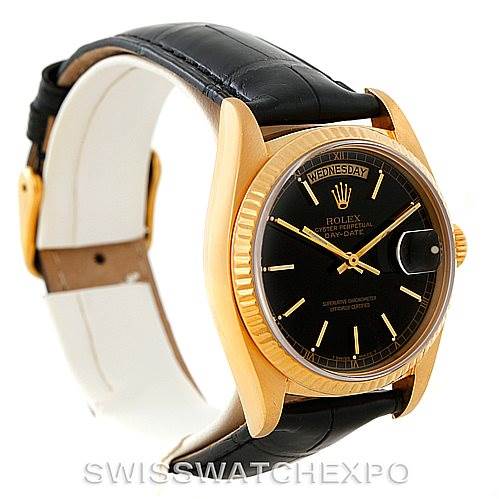 This image shows a side angle view of a Rolex President 18038 Men's Yellow Gold Black Dial 18038 Men's Yellow Gold Black Dial model watch, highlighting its black dial, bezel, and leather strap.
