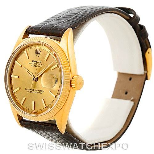 The image shows a side angle of a Rolex President 1601 Men
s Yellow Gold Champagne Dial 1601 Men
s Yellow Gold Champagne Dial model watch, highlighting its gold case, crown, and brown leather strap.