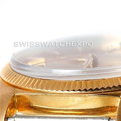 This image shows a close-up side view of the Rolex President 1601 Men
s Yellow Gold Champagne Dial 1601 Men
s Yellow Gold Champagne Dial model, including the case, crystal, and part of the bracelet attachment.