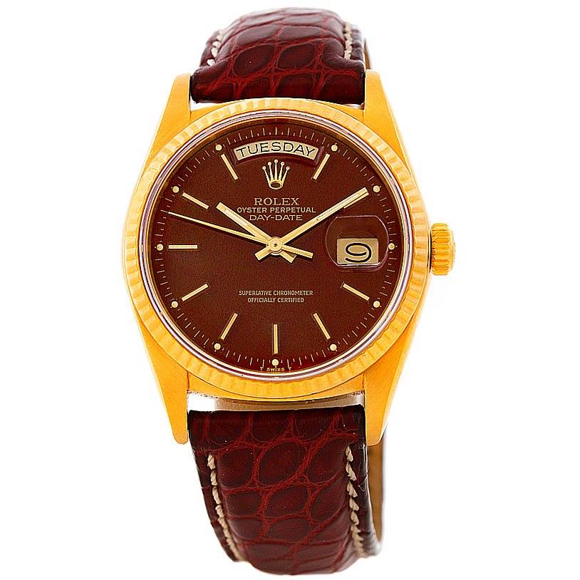 The image shows a front view of a Rolex President 18038 Men
s Yellow Gold Champagne Dial 18038 Men
s Yellow Gold Champagne Dial Model watch, featuring its bezel, dial, hour markers, hands, day and date windows, and leather strap.