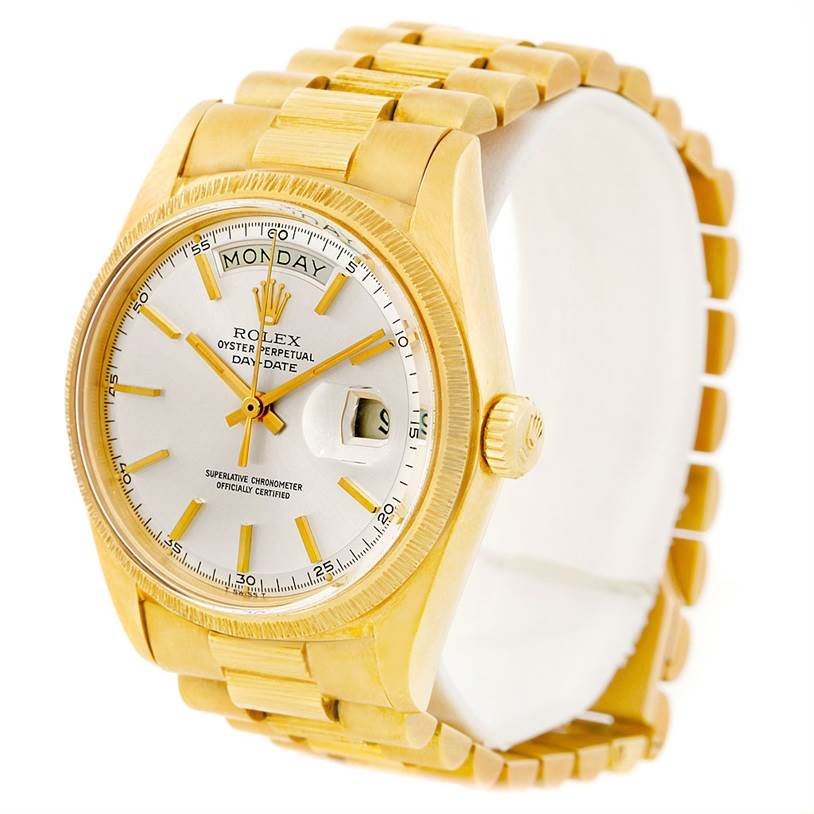 The image shows a Rolex President 1807 Men
s Yellow Gold Silver Dial 1807 Men
s Yellow Gold Silver Dial model watch from a front angle, highlighting its gold case, bracelet, dial, and day-date display.