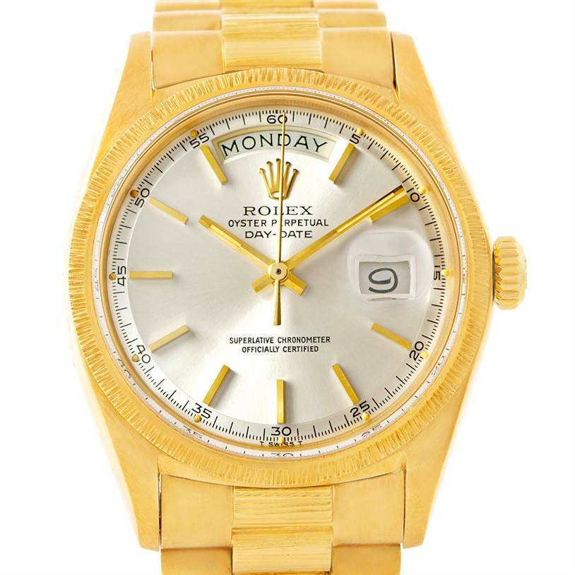 This image shows a front view of a Rolex President 1807 Men
s Yellow Gold Silver Dial 1807 Men
s Yellow Gold Silver Dial Day-Date model, displaying the dial, hands, and part of the bracelet.