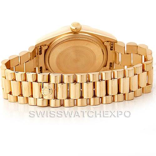 The image shows the back view of a Rolex President 18038 Men's Yellow Gold Black Dial 18038 Men's Yellow Gold Black Dial model, highlighting the case back and the gold bracelet.