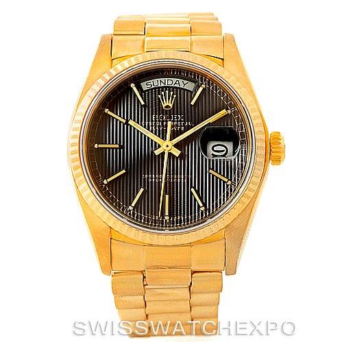 This image shows the front view of a Rolex President 18038 Men's Yellow Gold Black Dial 18038 Men's Yellow Gold Black Dial model watch, highlighting the dial, hands, day-date window, and bracelet.