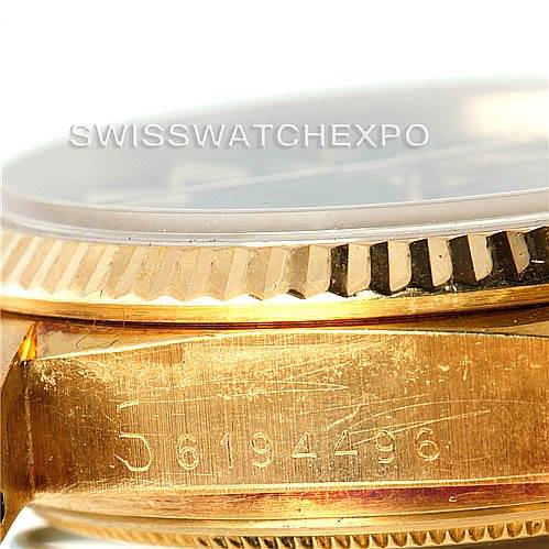 The image shows a close-up side view of a Rolex President 18038 Men's Yellow Gold Black Dial 18038 Men's Yellow Gold Black Dial model, focusing on the bezel and serial number on the case.