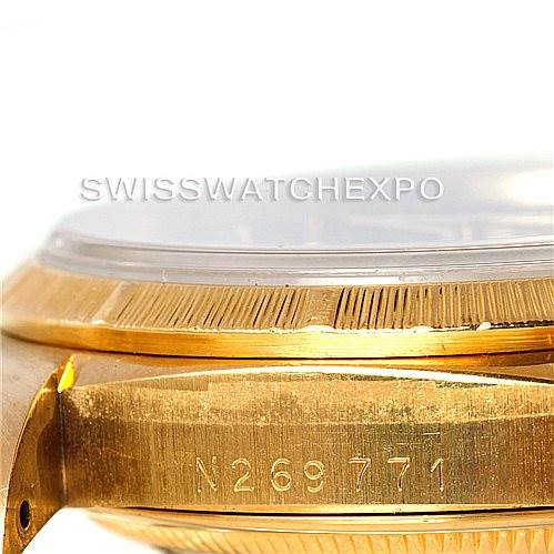 This image shows a side view of the Rolex President 18248 Men's Yellow Gold Blue Dial 18248 Men's Yellow Gold Blue Dial model watch, highlighting the serial number on the case and part of the bezel.