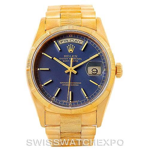 The image shows a front view of the Rolex President 18248 Men's Yellow Gold Blue Dial 18248 Men's Yellow Gold Blue Dial model watch, displaying its gold bracelet, blue dial, day, and date features.
