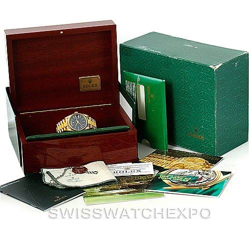 The image shows a Rolex President 18248 Men's Yellow Gold Blue Dial 18248 Men's Yellow Gold Blue Dial model watch with its box, manuals, and accessories from a front angle.