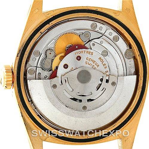 The image shows the internal mechanical movement of a Rolex President 18248 Men's Yellow Gold Blue Dial 18248 Men's Yellow Gold Blue Dial model watch from a rear view angle.