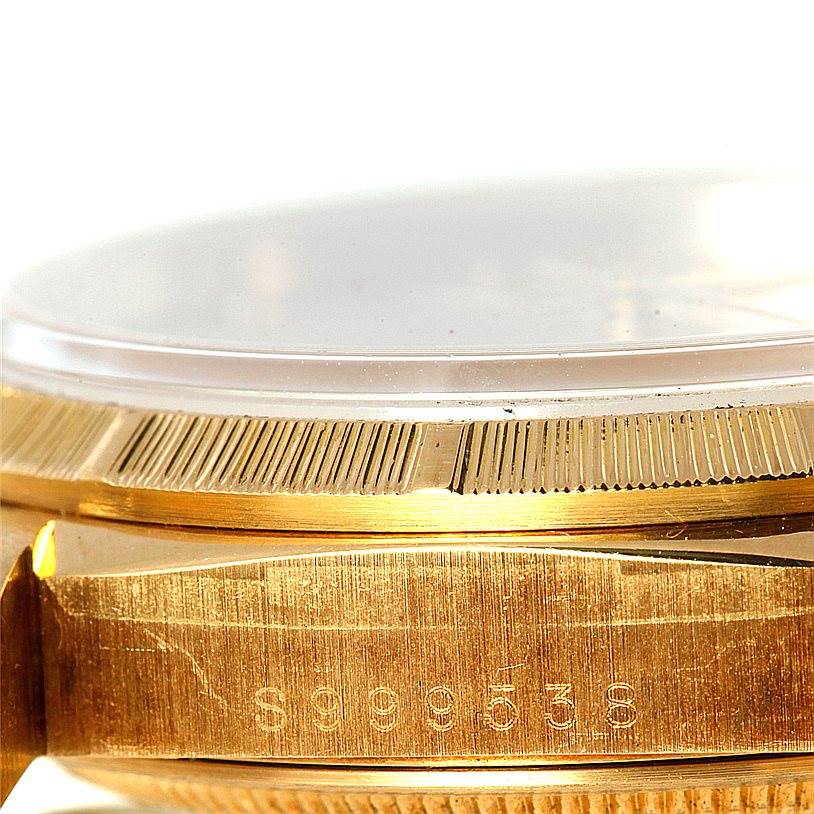 This image shows a close-up side view of the bezel and case of a Rolex President 18248 Men
s Yellow Gold Champagne Dial 18248 Men
s Yellow Gold Champagne Dial model watch.