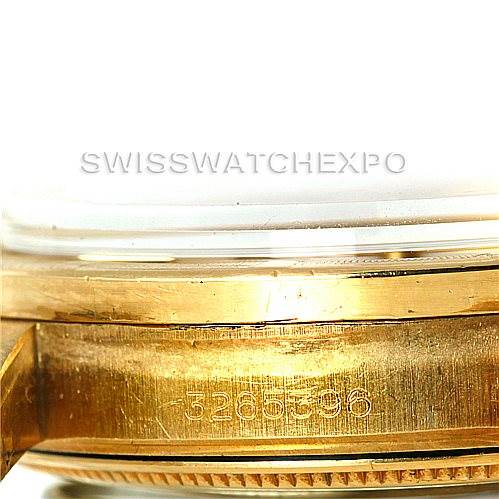 This close-up image shows the side of a Rolex President 1501 Men
s Yellow Gold Champagne Dial 1501 Men
s Yellow Gold Champagne Dial model, focusing on the serial number.
