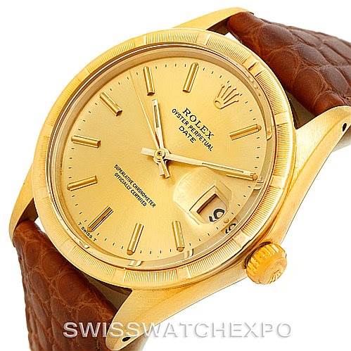 This image shows a close-up of a Rolex President 1501 Men
s Yellow Gold Champagne Dial 1501 Men
s Yellow Gold Champagne Dial model watch, highlighting the face, crown, and part of the brown strap.