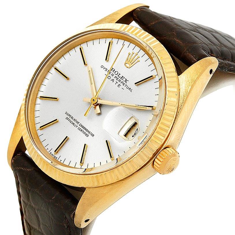The image shows a Rolex President 1503 Men
s Yellow Gold Silver Dial 1503 Men
s Yellow Gold Silver Dial watch from a three-quarter angle, highlighting the face, crown, and leather band.