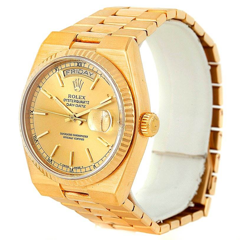This image shows a Rolex President 19000 Men
s Yellow Gold Champagne Dial 19000 Men
s Yellow Gold Champagne Dial Oysterquartz Day-Date watch, featuring the gold case, dial, crown, and bracelet from a side angle.