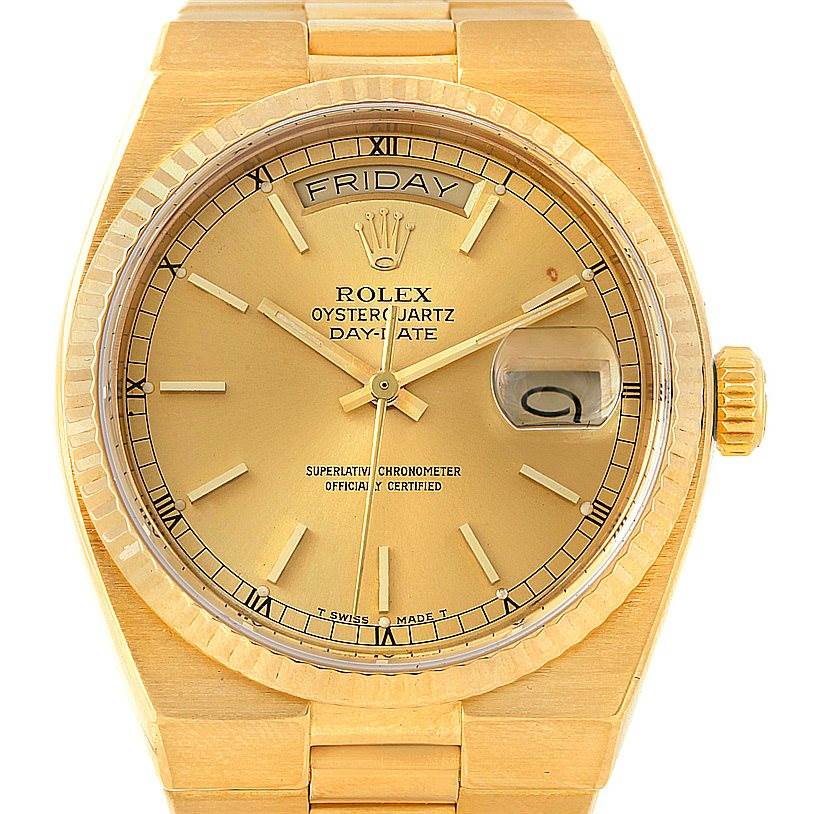 This is a frontal view of the Rolex President 19000 Men
s Yellow Gold Champagne Dial 19000 Men
s Yellow Gold Champagne Dial Oysterquartz Day-Date watch, showing the dial, bezel, hands, crown, and bracelet.