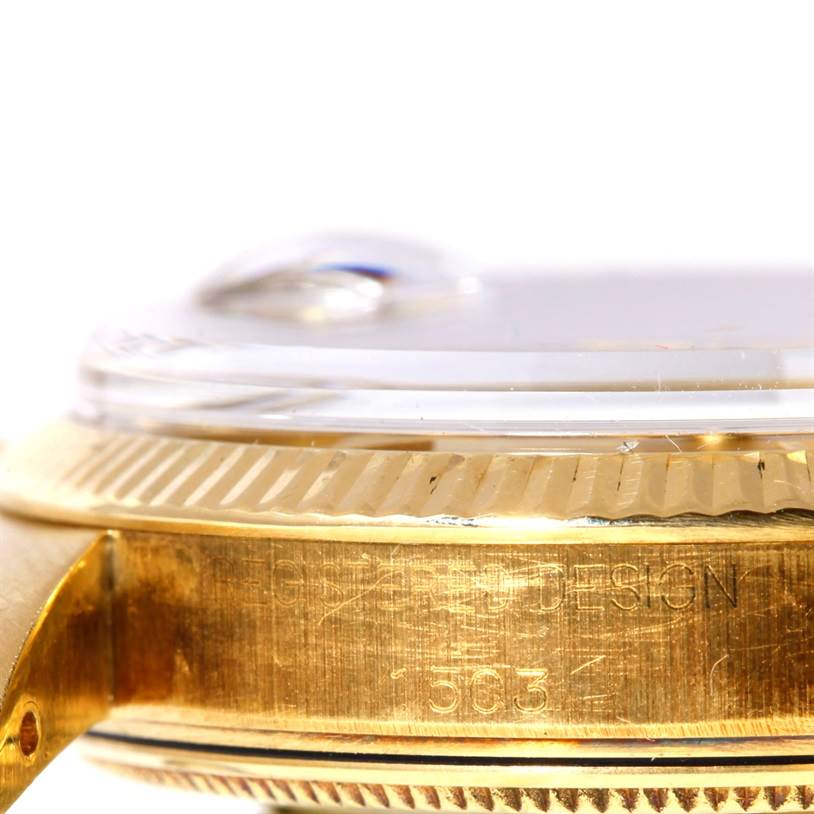 The image shows a close-up side view of the gold bezel, lugs, and case of the Rolex President 1503 Men
s Yellow Gold Champagne Dial 1503 Men
s Yellow Gold Champagne Dial model watch.