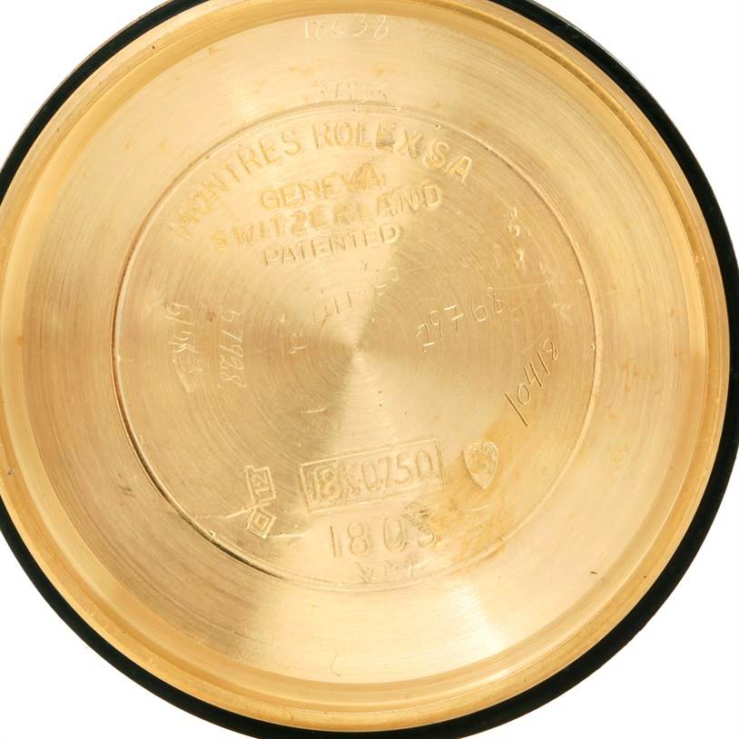 The image shows the inside case back of a Rolex President 1803 Men
s Yellow Gold Silver Dial 1803 Men
s Yellow Gold Silver Dial model watch, highlighting the engravings and markings.