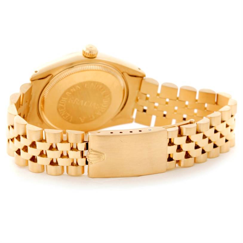 The image shows the back side of the Rolex President 1503 Men
s Yellow Gold Silver Dial 1503 Men
s Yellow Gold Silver Dial model watch, highlighting its clasp and bracelet.