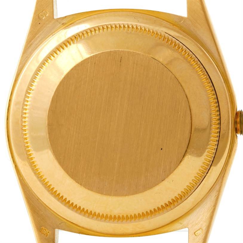 This image shows the back case of a Rolex President 18238 Men's Yellow Gold White Dial 18238 Men's Yellow Gold White Dial model watch, viewed from the rear.