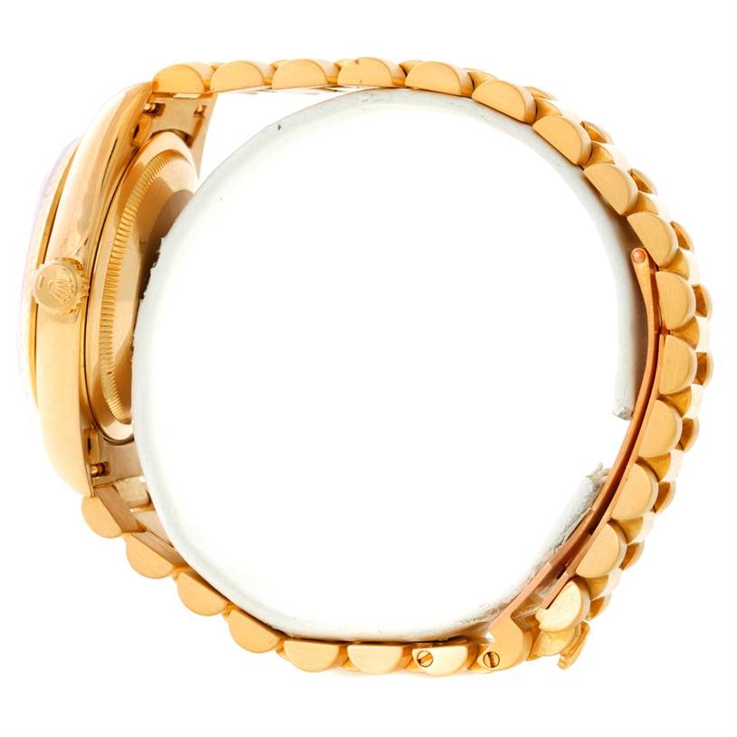 The image shows a side view of a Rolex President 18238 Men's Yellow Gold White Dial 18238 Men's Yellow Gold White Dial model watch, highlighting its gold case and bracelet.