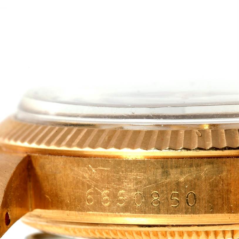 The image shows the side of the Rolex President 1503 Men
s Yellow Gold Champagne Dial 1503 Men
s Yellow Gold Champagne Dial model watch, highlighting the case and bezel with the serial number visible.