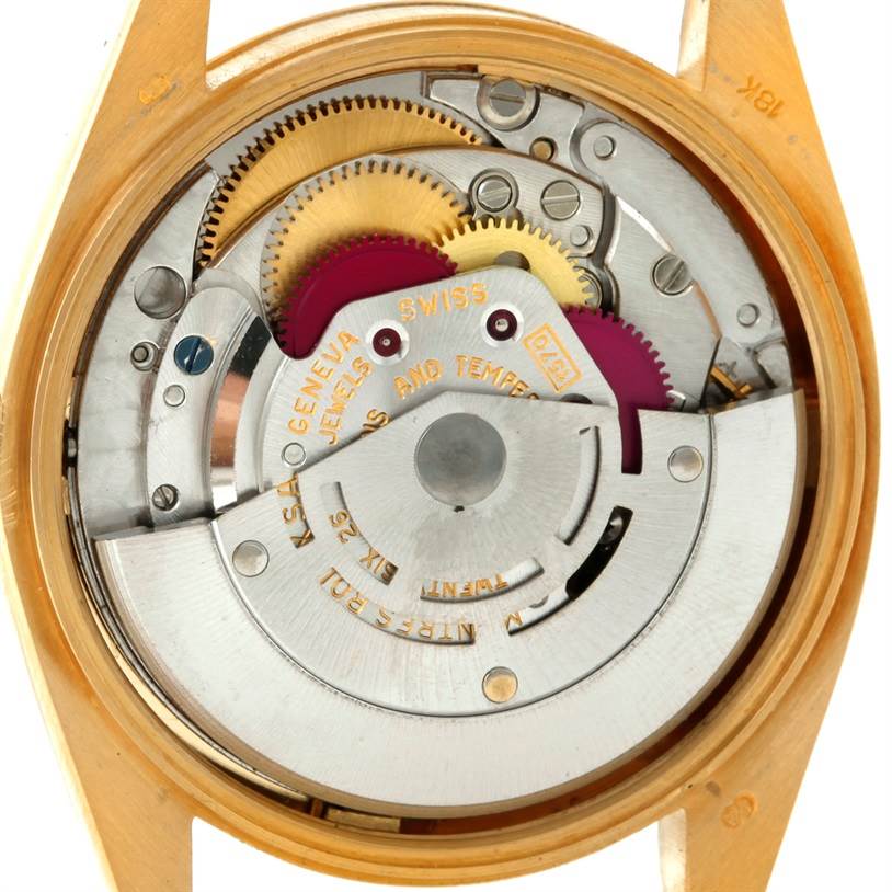 The image shows the movement and inner mechanics of a Rolex President 1503 Men
s Yellow Gold Champagne Dial 1503 Men
s Yellow Gold Champagne Dial model watch from a backside view.