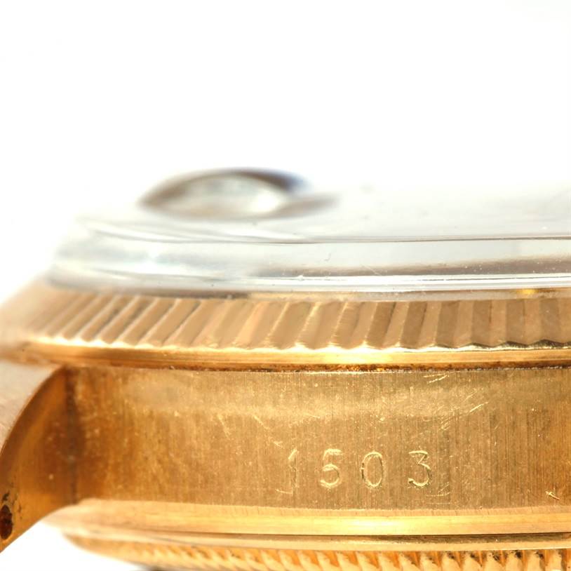Side angle showing the case, bezel, and crystal of the Rolex President 1503 Men
s Yellow Gold Champagne Dial 1503 Men
s Yellow Gold Champagne Dial model marked "1503."