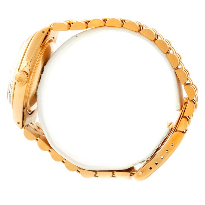 The image shows a side view of a Rolex President 1503 Men
s Yellow Gold Champagne Dial 1503 Men
s Yellow Gold Champagne Dial model watch, highlighting the crown, case, and bracelet.