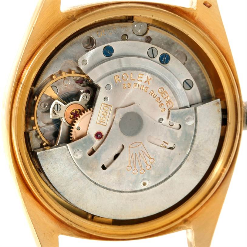 This image shows the internal mechanics of a Rolex President 1601 Men's Yellow Gold White Dial 1601 Men's Yellow Gold White Dial model watch from the back, highlighting its movement and intricate components.