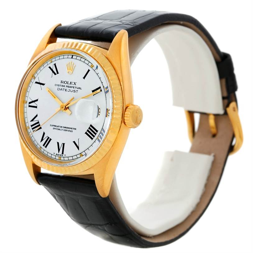 This image shows a Rolex President 1601 Men's Yellow Gold White Dial 1601 Men's Yellow Gold White Dial model watch from a side angle, revealing the face, bezel, crown, and black leather strap.