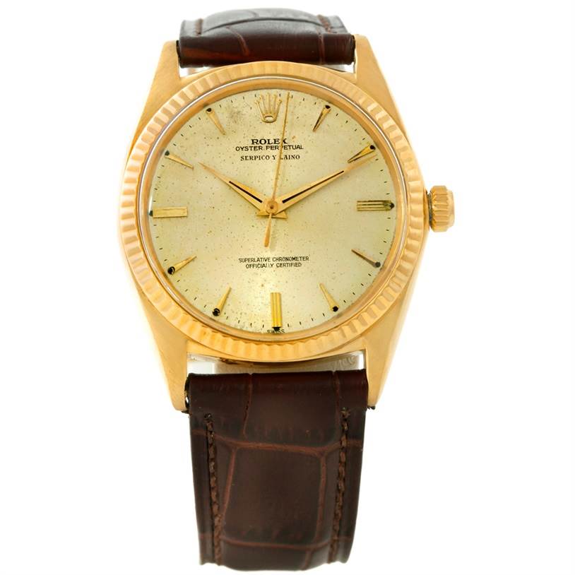 The image shows a front view of a Rolex President 1013 Men
s Yellow Gold Champagne Dial 1013 Men
s Yellow Gold Champagne Dial model watch, displaying its dial, bezel, crown, and leather strap.
