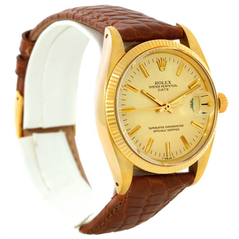 The image shows a side-angle view of a Rolex President 1503 Men
s Yellow Gold Champagne Dial 1503 Men
s Yellow Gold Champagne Dial model watch, highlighting its gold case, fluted bezel, and brown leather strap.