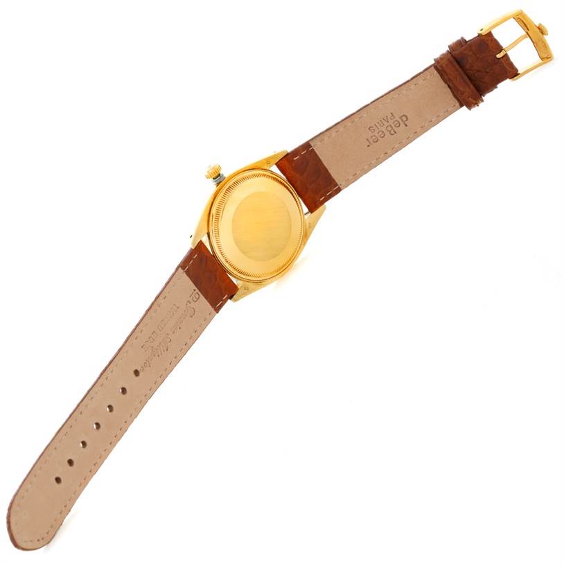 The image shows the back case and leather strap of the Rolex President 1503 Men
s Yellow Gold Champagne Dial 1503 Men
s Yellow Gold Champagne Dial watch.