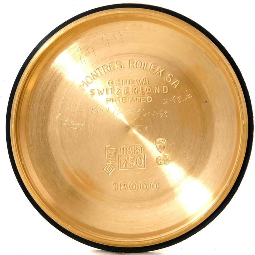 The image shows the inside case back of a Rolex President 18038 Men's Yellow Gold Blue Dial 18038 Men's Yellow Gold Blue Dial watch, emphasizing its engravings and metal markings.