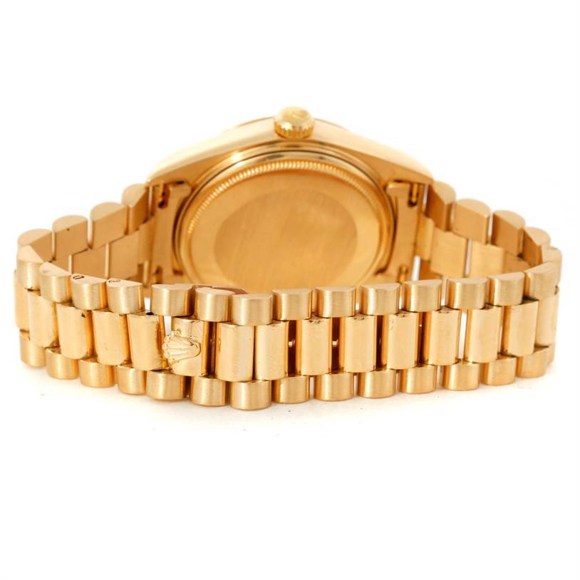 This image shows the back case and bracelet of a Rolex President 18038 Men's Yellow Gold Blue Dial 18038 Men's Yellow Gold Blue Dial model watch.