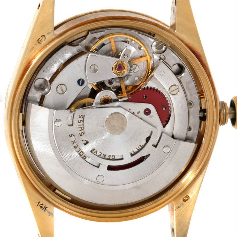 This image shows the internal mechanics of a Rolex President 15037 Men
s Yellow Gold Champagne Dial 15037 Men
s Yellow Gold Champagne Dial model watch viewed from the back with the case back removed.