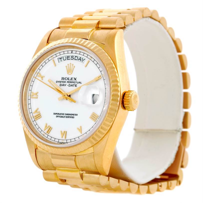 This image shows a side angle of the Rolex President 18038 Men
s Yellow Gold White Dial 18038 Men
s Yellow Gold White Dial model, highlighting the face, bezel, crown, and part of the bracelet.