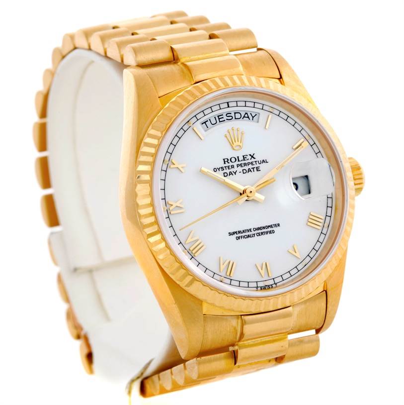 This image shows the Rolex President 18038 Men
s Yellow Gold White Dial 18038 Men
s Yellow Gold White Dial model watch from an angled side view, highlighting the bracelet, case, and face.