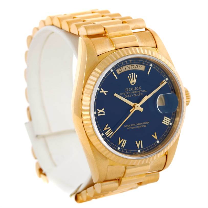 The image shows a Rolex President 18038 Men's Yellow Gold Blue Dial 18038 Men's Yellow Gold Blue Dial model watch at a slight angle, highlighting its gold casing, blue dial, and President bracelet.