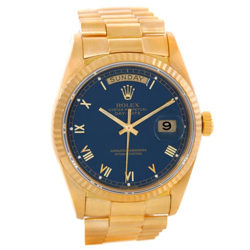 This image shows a Rolex President 18038 Men's Yellow Gold Blue Dial 18038 Men's Yellow Gold Blue Dial model watch with a gold band, blue dial displaying the day and date, and Roman numerals from a front view.