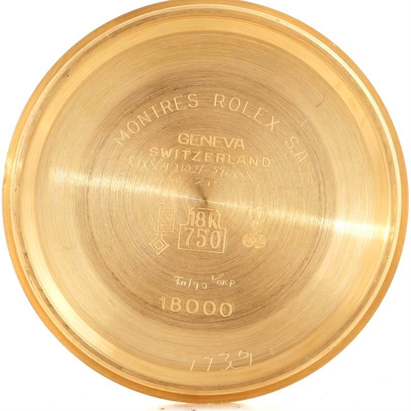 This image shows the inner case back of a Rolex President 18038 Men's Yellow Gold Blue Dial 18038 Men's Yellow Gold Blue Dial model, highlighting its 18K gold material and engravings.