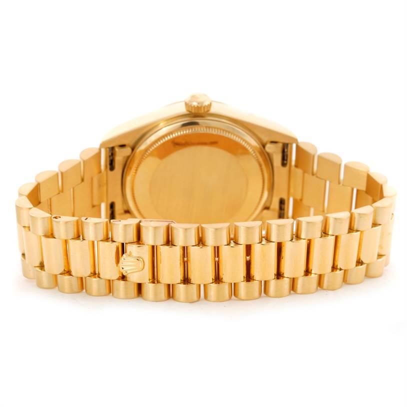 The image shows the back and bracelet of a Rolex President 18038 Men's Yellow Gold Blue Dial 18038 Men's Yellow Gold Blue Dial model watch, highlighting the clasp and case back.