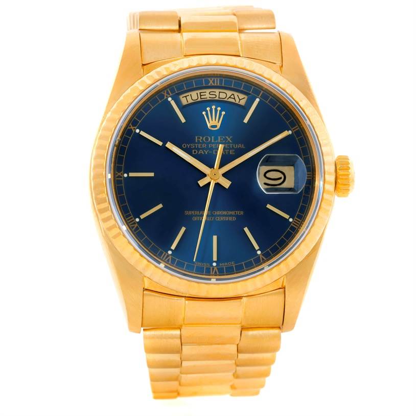 This image shows the dial, bezel, and bracelet of a Rolex President 18038 Men's Yellow Gold Blue Dial 18038 Men's Yellow Gold Blue Dial model watch viewed from the front.