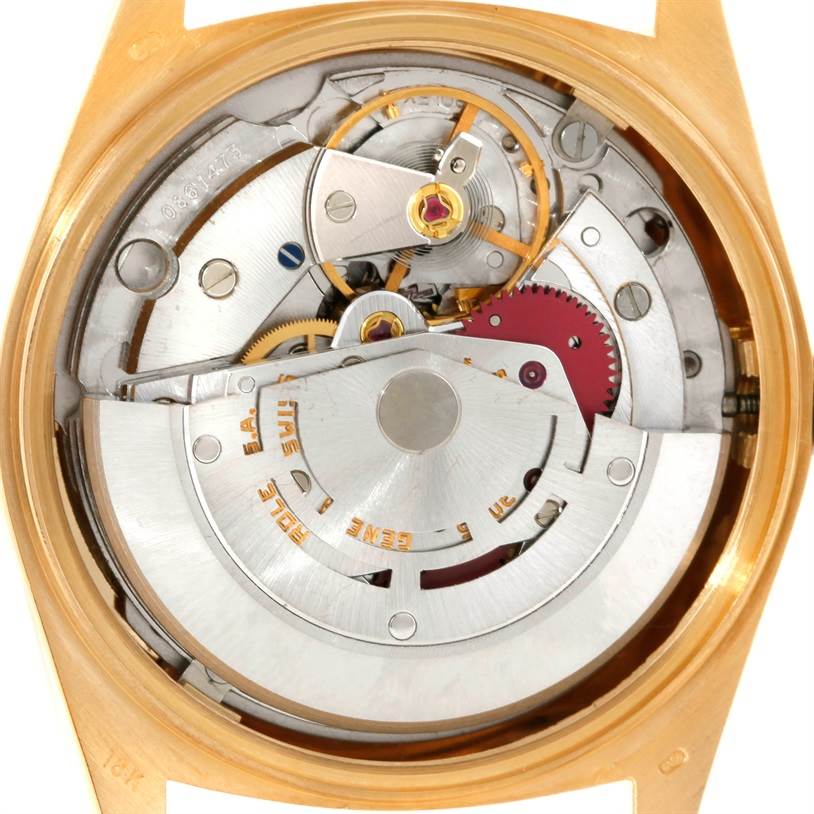 The image shows the internal movement mechanism of a Rolex President 18038 Men's Yellow Gold Blue Dial 18038 Men's Yellow Gold Blue Dial model watch from a rear angle.