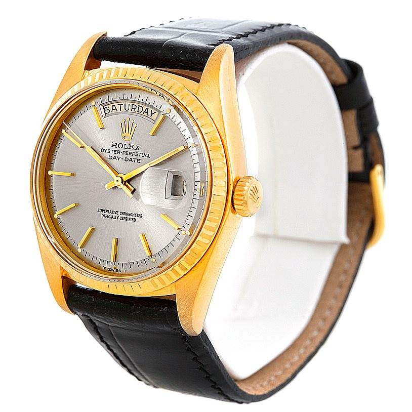 The image shows a Rolex President 1803 Men's Yellow Gold Grey Dial 1803 Men's Yellow Gold Grey Dial model watch angled to display its face, crown, and black leather strap.