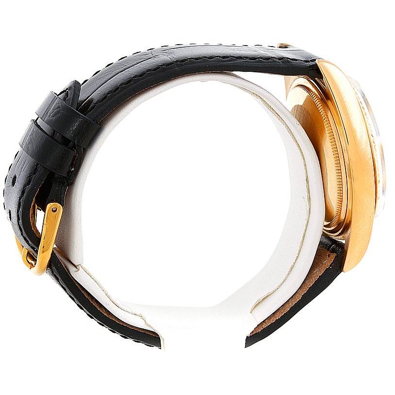 This image shows a side view of a Rolex President 1803 Men's Yellow Gold Grey Dial 1803 Men's Yellow Gold Grey Dial watch, including the case, crown, and leather strap with a buckle.