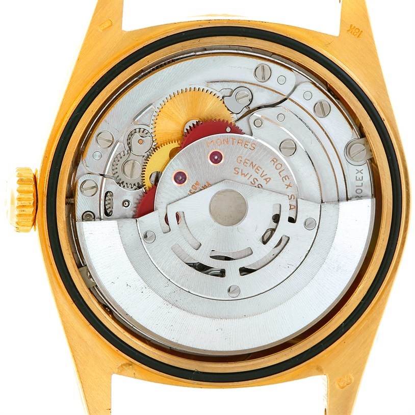 The image shows the interior mechanics of a Rolex President 18248 Men's Yellow Gold Champagne Dial 18248 Men's Yellow Gold Champagne Dial model watch from the back angle.